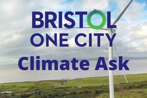 A wind turbine on a green slope with the words Bristol One City Climate Ask across the image