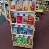 A shelf of books in a public library.
