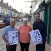 Three people stood on St Mark's Road who are, from left to right, the owner of Bristol Sweet Mart, Mr Rashid, local resident Vanessa Kier and Cllr Malik. Mr Rashid and Cllr Malik both hold postster showing the a map which sets out the plans for the road.