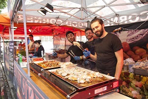 Men on a market stall