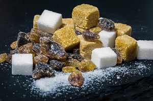 Lumps of white and brown sugar