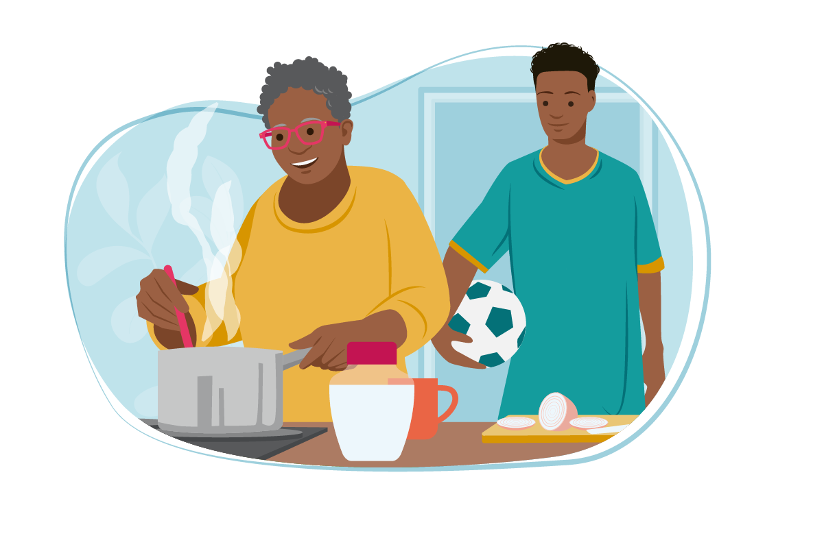 Woman cooking with young man holding football watching