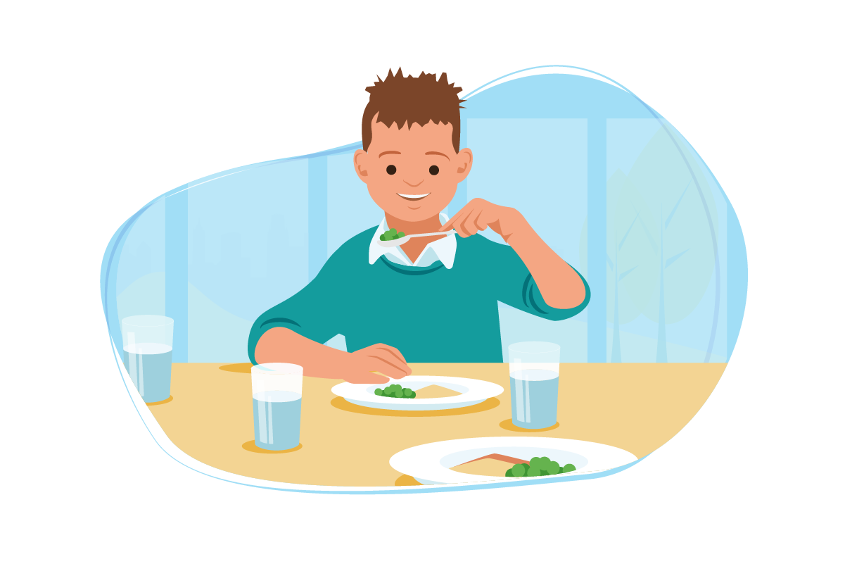 School boy eating dinner