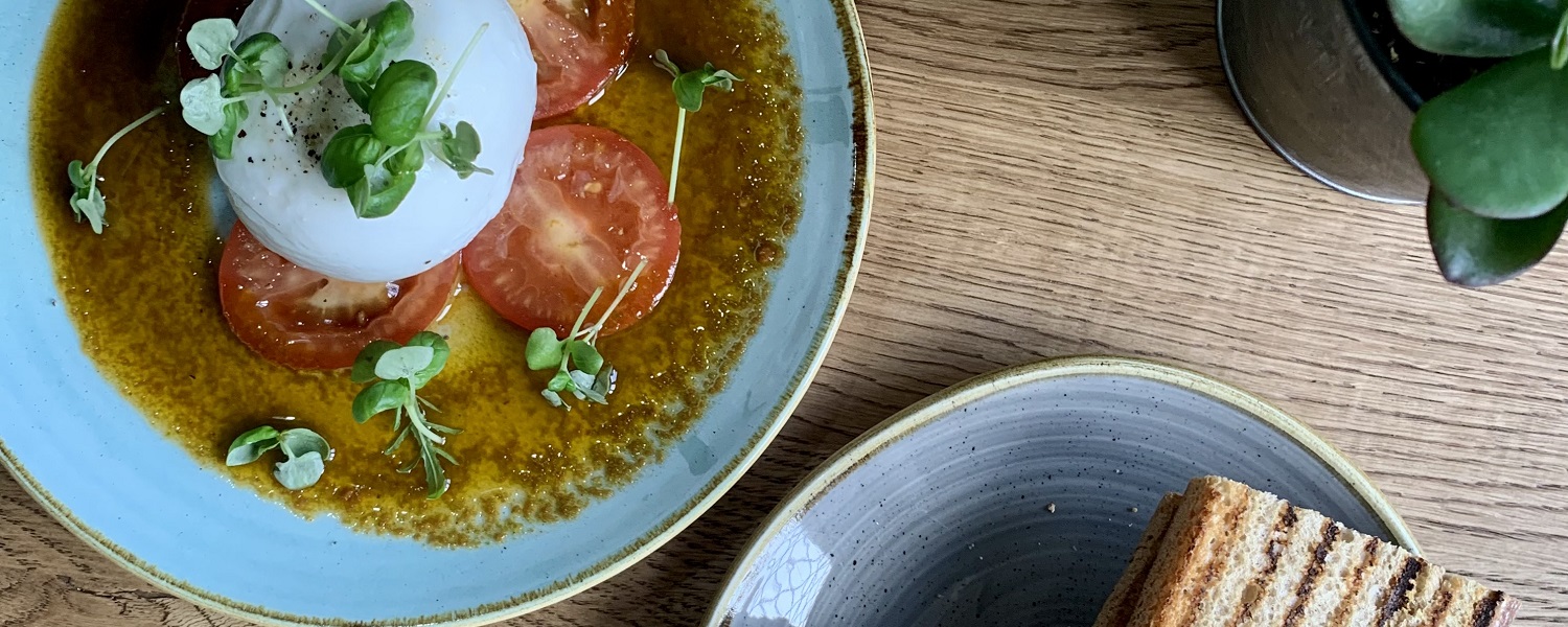 Mozzarella and tomato salad with toast