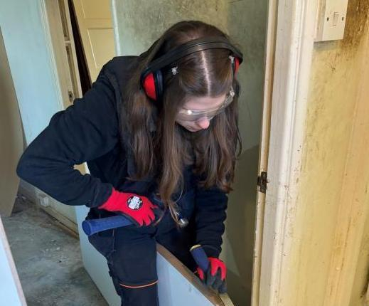 Maisie, who is doing a level 3 site carpentry apprenticeship 