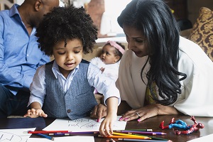 Child using colouring pencils