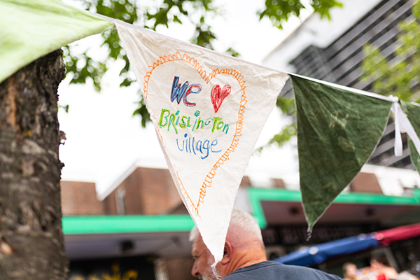 A pennant with the text 'We heart Brislington Village' hand painted on it
