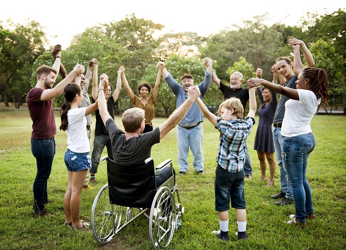 People holding hands in a circle