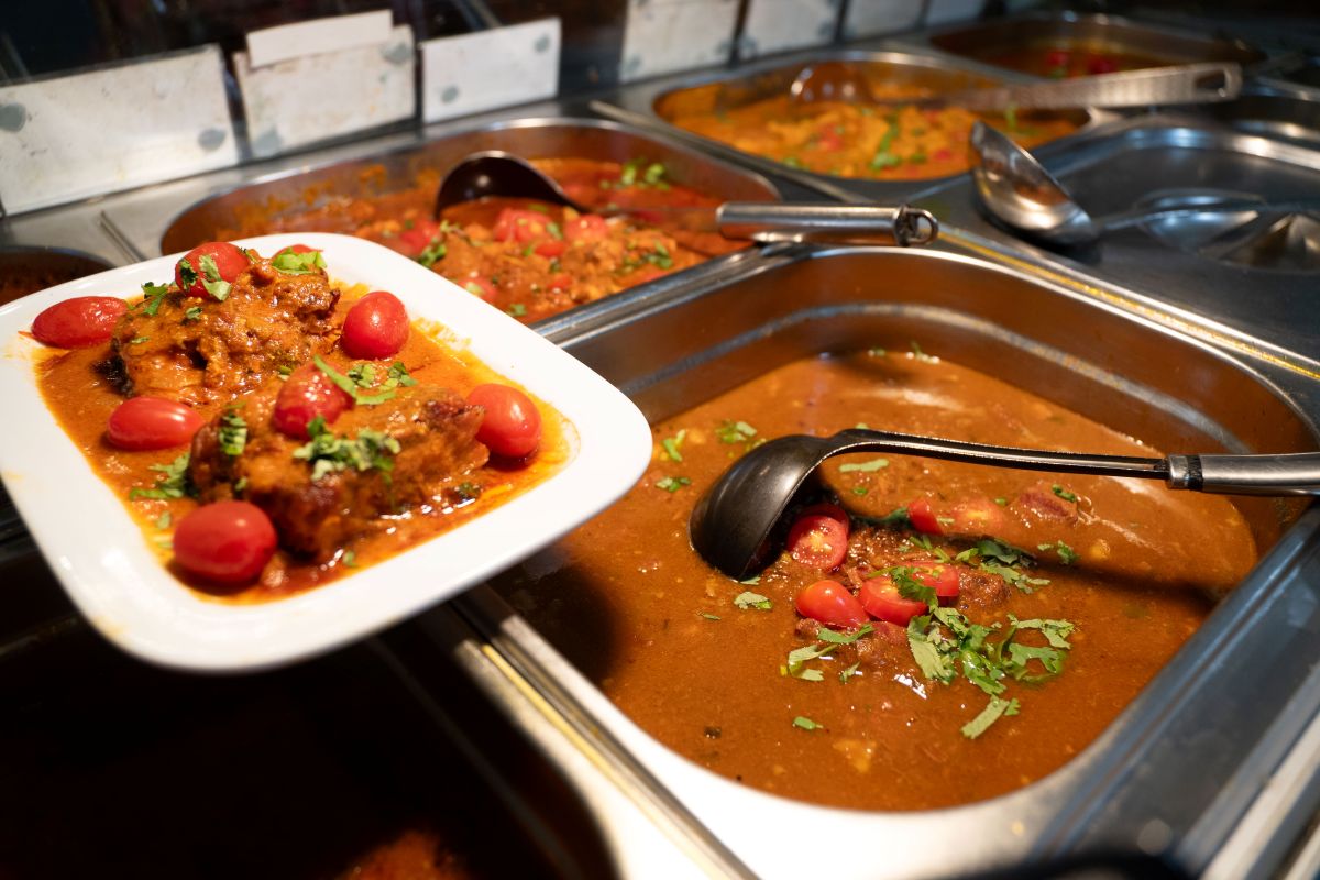 A plate of hot food being served