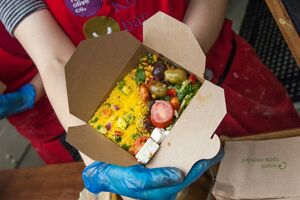 Rice and other food in a small cardboard box