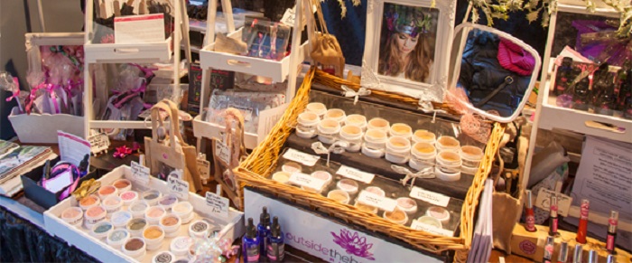 Pots of glitter on a market stall