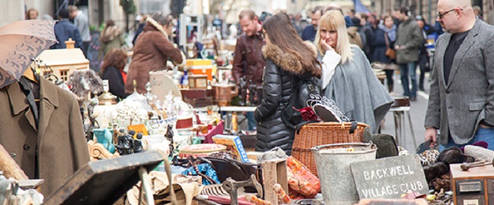 People looking at market stalls