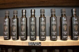 Bottles of olive oil on a shelf