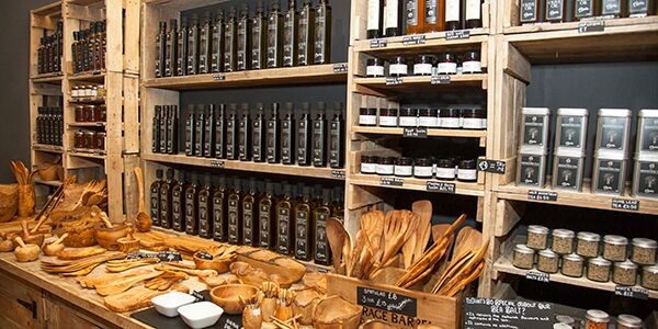 A shop selling bottle of oil and other food