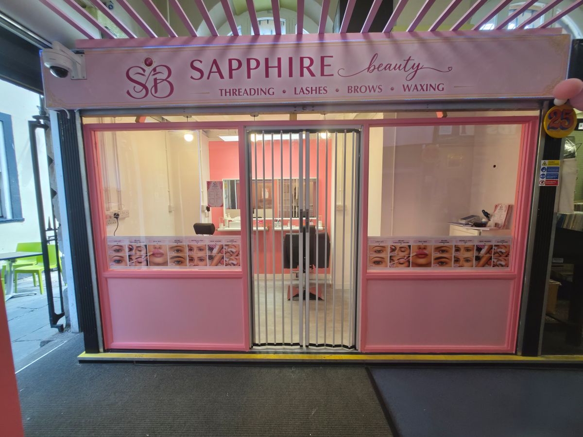 The sapphire beauty store, which has a pink exterior 