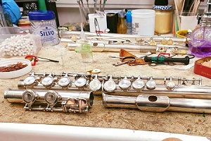 Some flutes being repaired