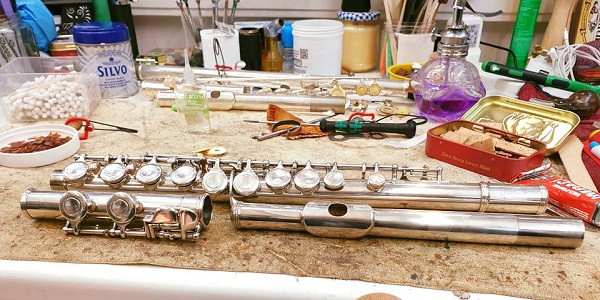 A flute being repaired