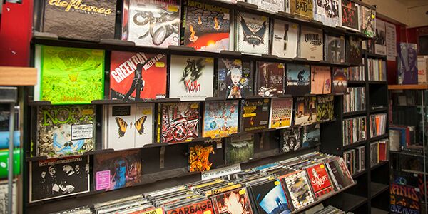 Rock albums on the wall of a shop