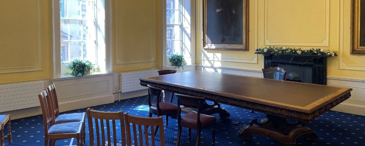 a high ceilinged room in old council house